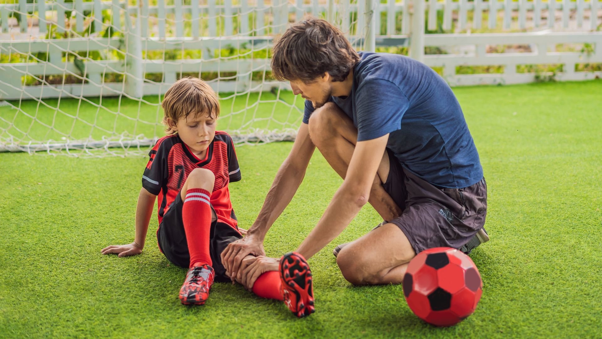 young football player with a leg injury