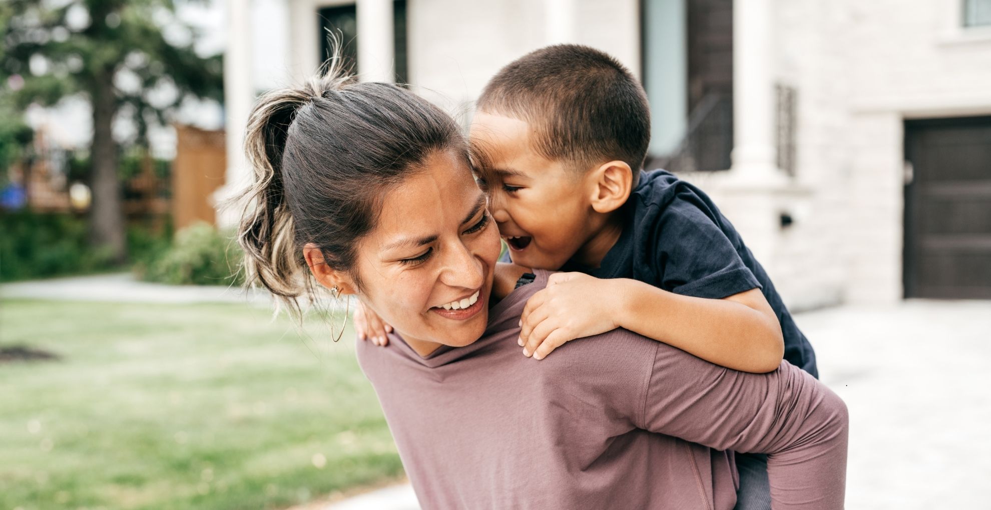 mother carrying child representing a good candidate for chiropractic treatment
