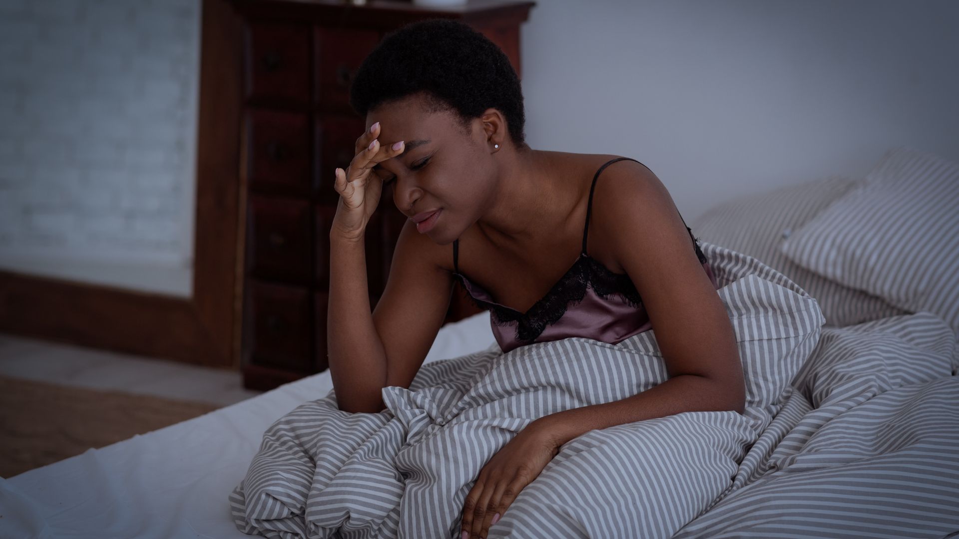 woman suffering from a migraine