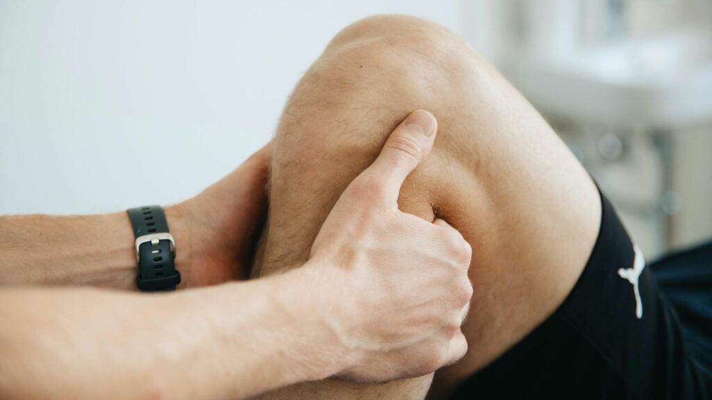 performing physio on a patients knee