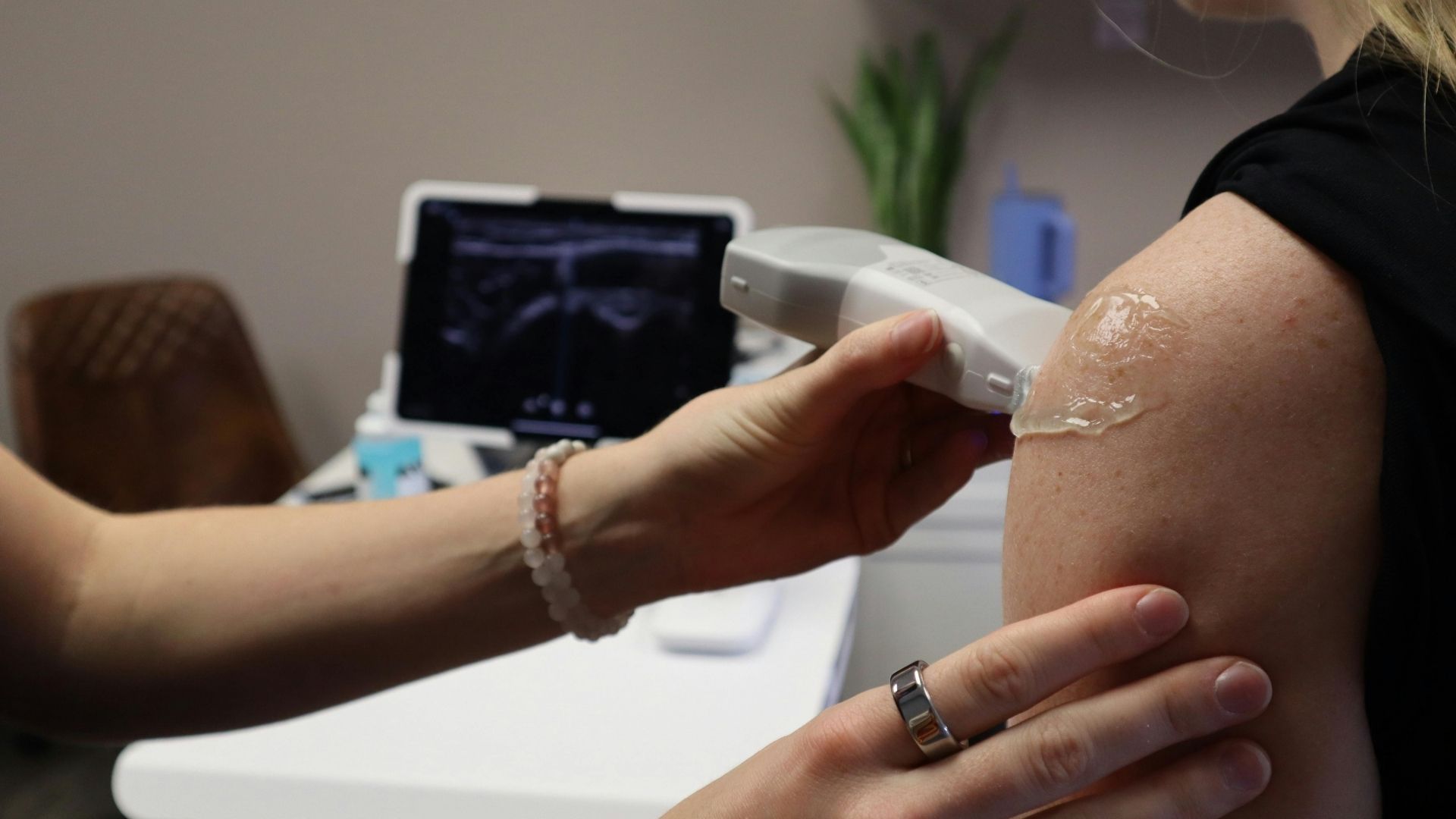 person getting an ultrasound on shoulder